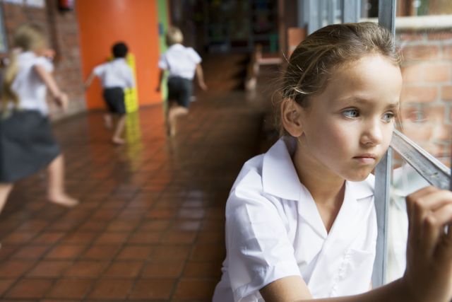 Girl Looking out of Window